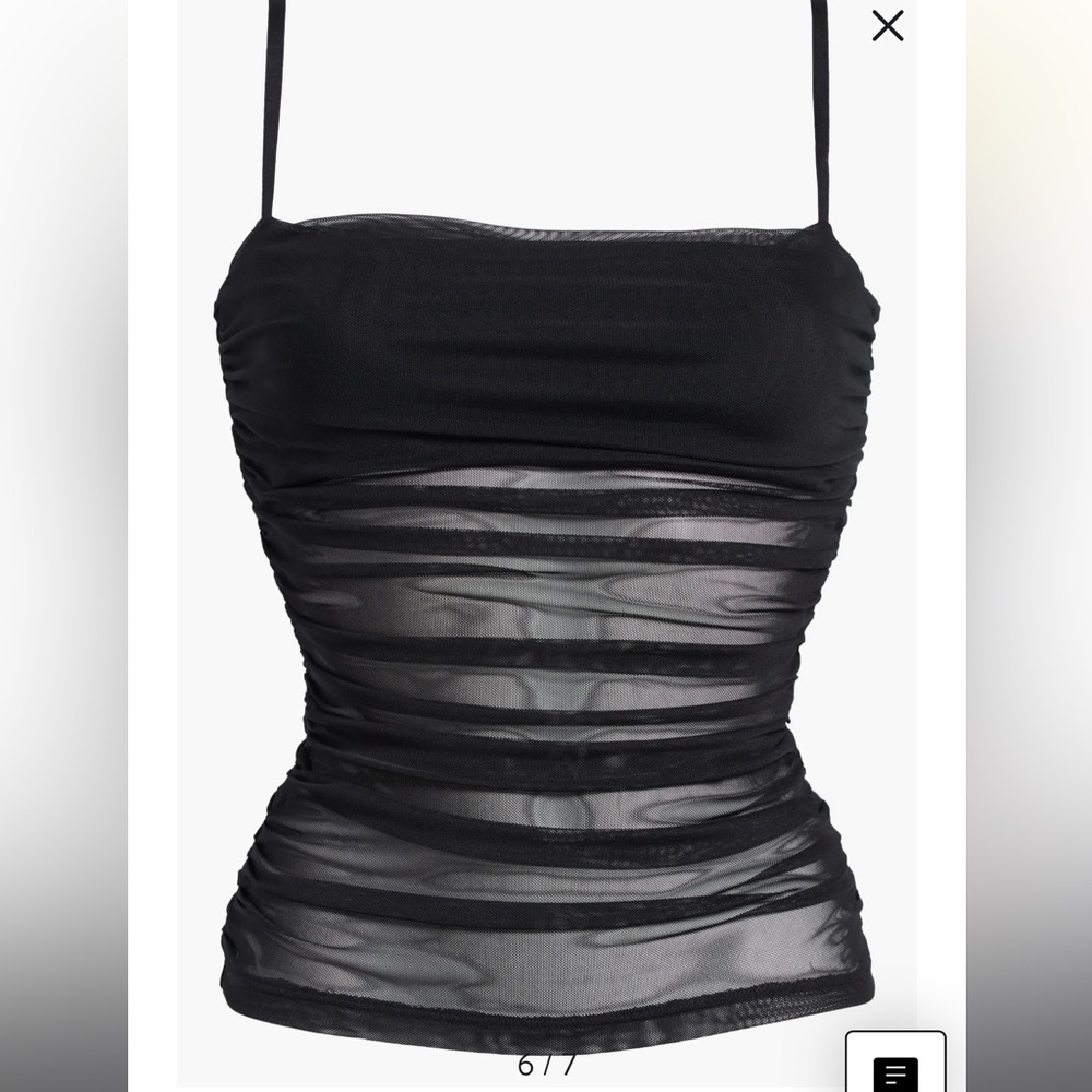 mesh see through top, chest is closed. never worn.